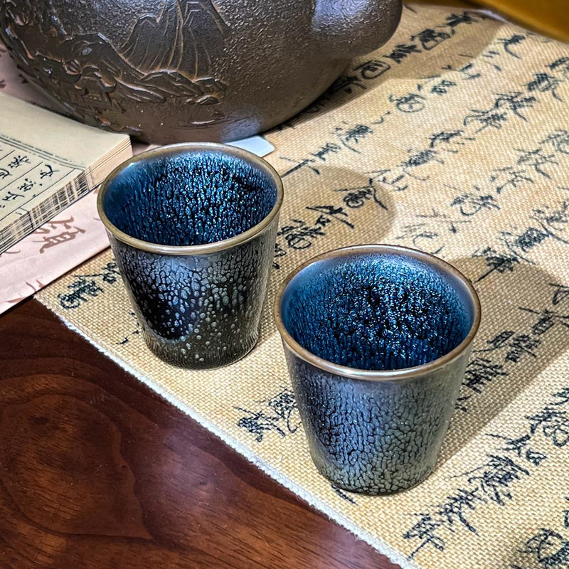 全手工薄胎油滴杯板指杯高端品茗杯對杯A tea cup with a thin tire is full of oil droplets and full of glaze.